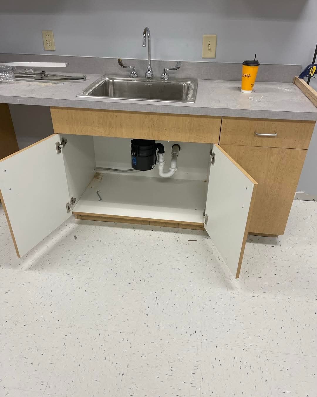 Kitchen sink and garbage disposal installation